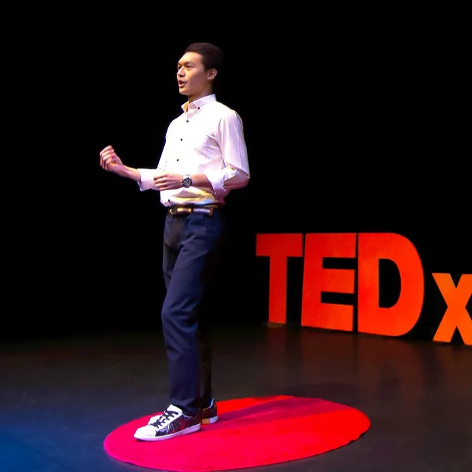 Freeman Fung speaking on TedX stage