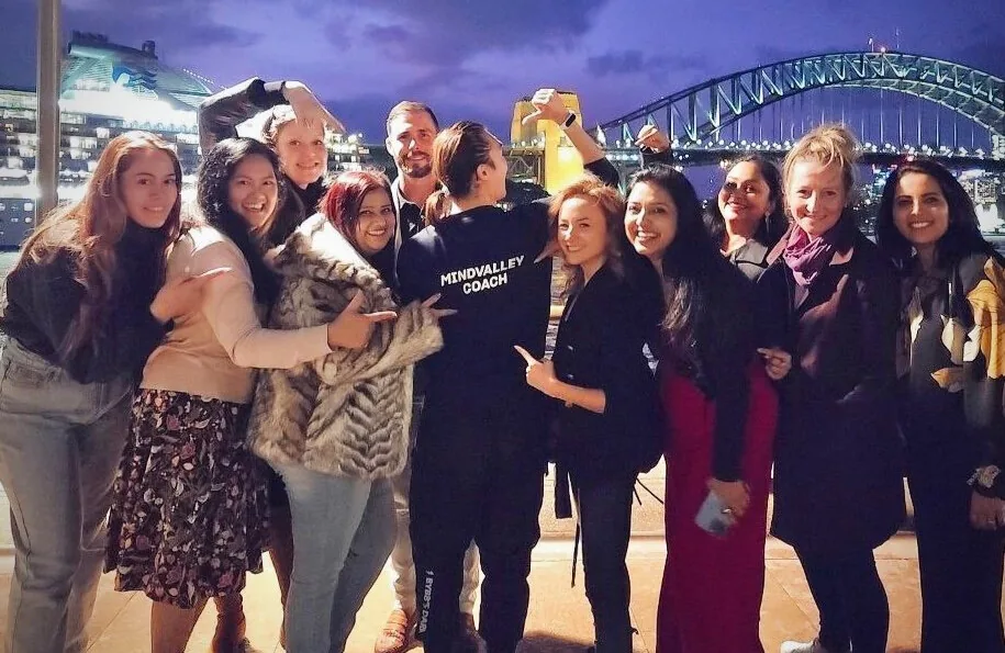 Sydney mindvalley coach pointing harbour bridge
