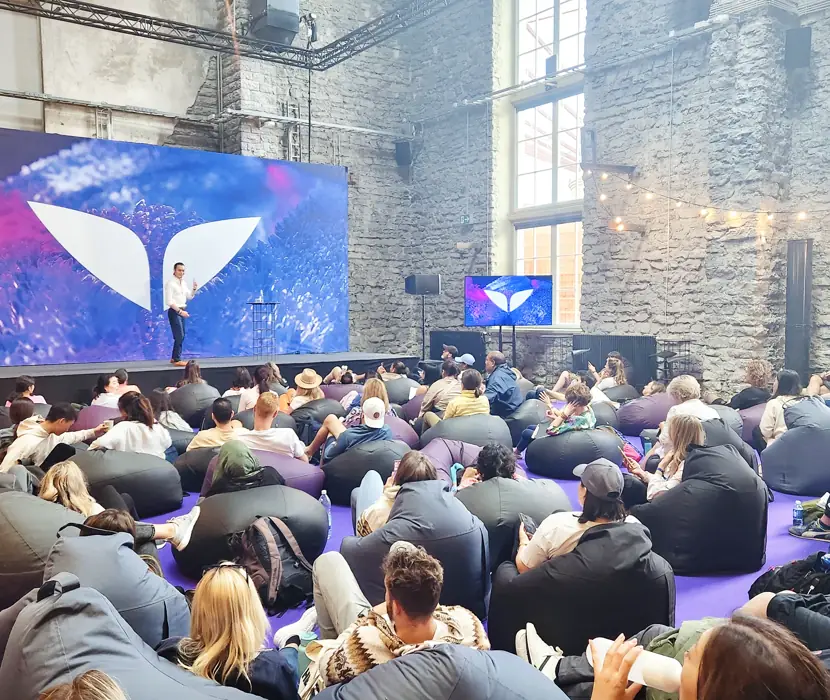Freeman Fung addressing the main stage audience at Mindvalley University 2023, Tallinn, Estonia