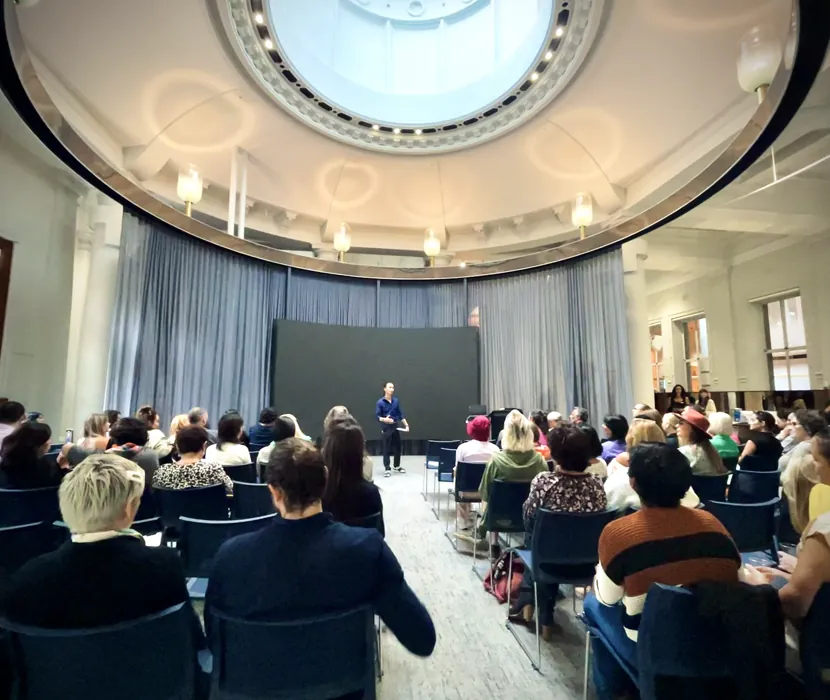 Freeman Fung presenting at a LumiVitae event