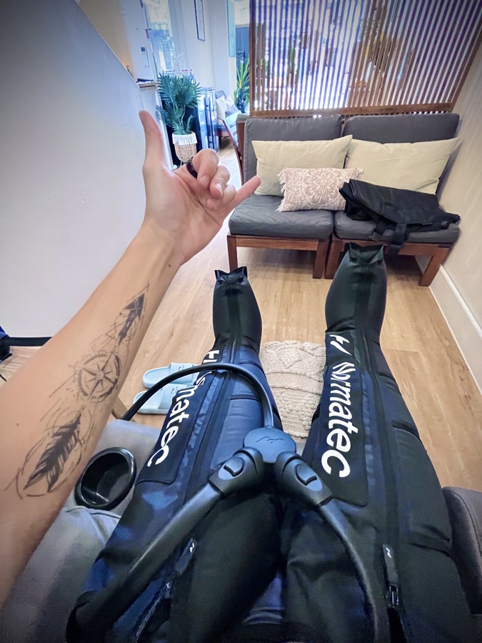 Freeman Fung wearing Normatec compression recovery boots