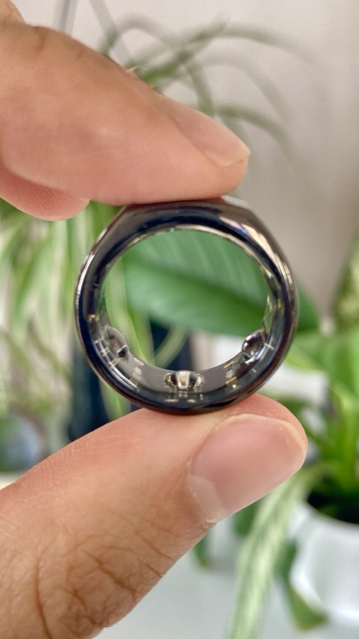 Close-up of the Oura Ring worn on a finger
